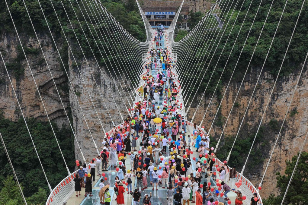 With the coronavirus pandemic limiting travel in China, many tourist guides have turned to virtual tours. Photo: AFP