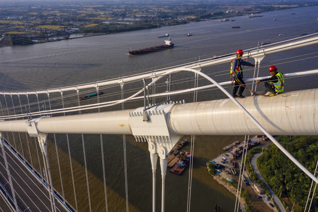 China plans to increase its total transport network to 700,000km (435,000 miles), including around 460,000km of roads, by 2035. Photo: EPA-EFE