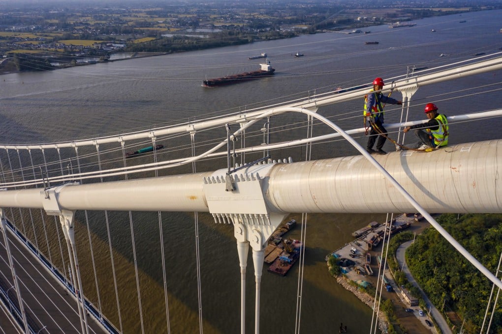China plans to increase its total transport network to 700,000km (435,000 miles), including around 460,000km of roads, by 2035. Photo: EPA-EFE