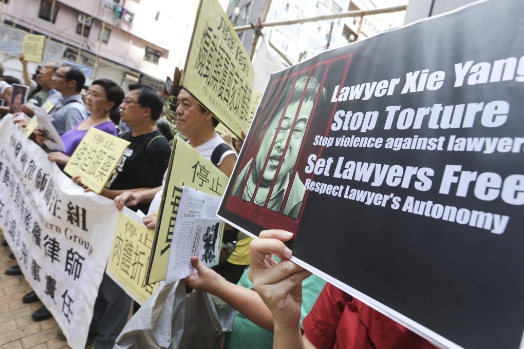 Members of the China Human Rights Lawyers Concern Group hold a protest in 2017 over the treatment of the profession on the mainland. Photo: Dickson Lee