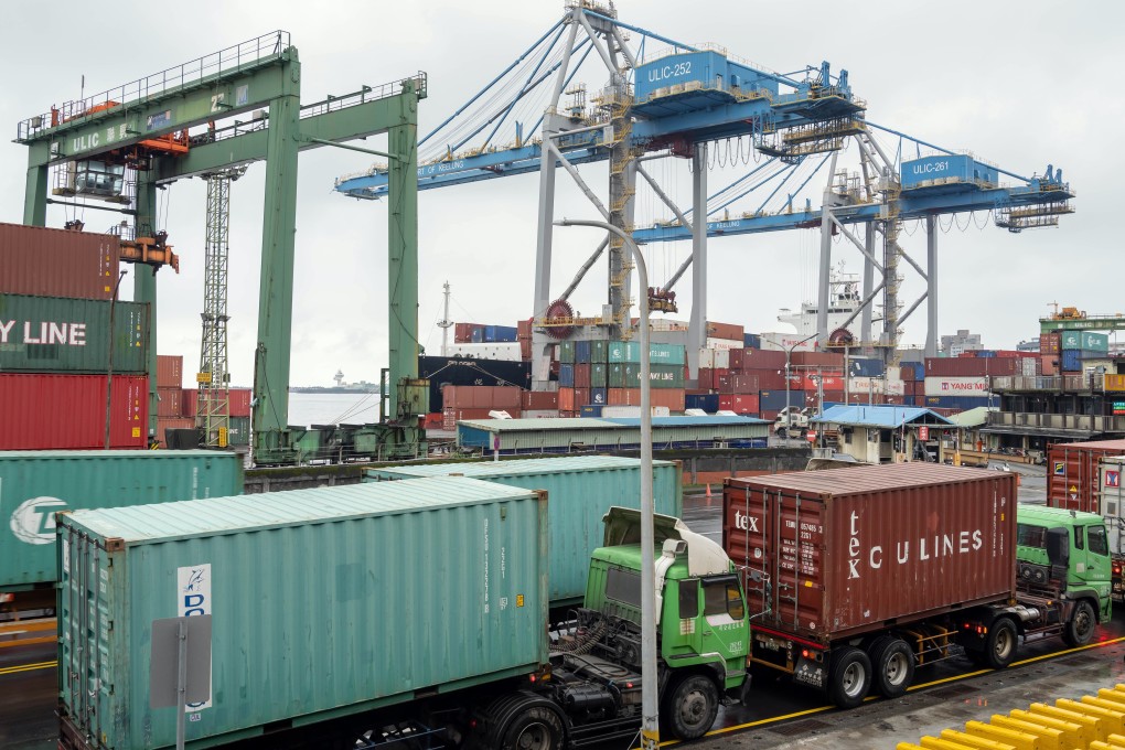 Container trucks line up to enter the Port of Keelung, Taiwan, in April. Photo: Bloomberg