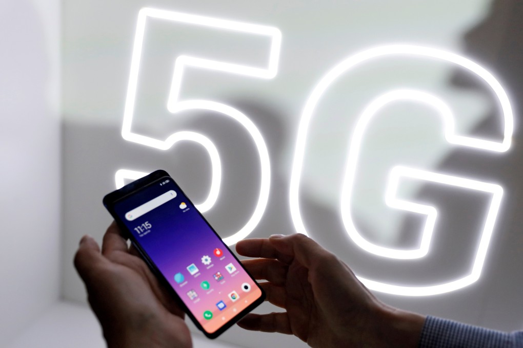 A person checks out the new Xiaomi Mi 9 mobile phone ahead of the Mobile World Congressin Barcelona, Spain, on February 24, 2019. Photo: Reuters