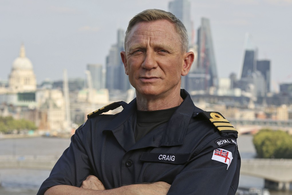 English actor Daniel Craig poses for a picture while wearing the honorary rank of commander he received from the Royal Navy. Photo: Lee Blease/Ministry of Defence via PA Media/DPA