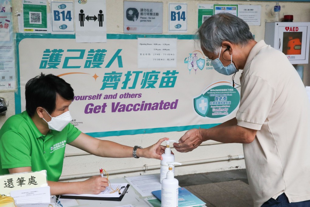 A resident queues up to get vaccinated at Choi Hung Road Badminton Centre. Hong Kong is still struggling to ramp up its Covid-19 inoculation rate. Photo: Edmond So