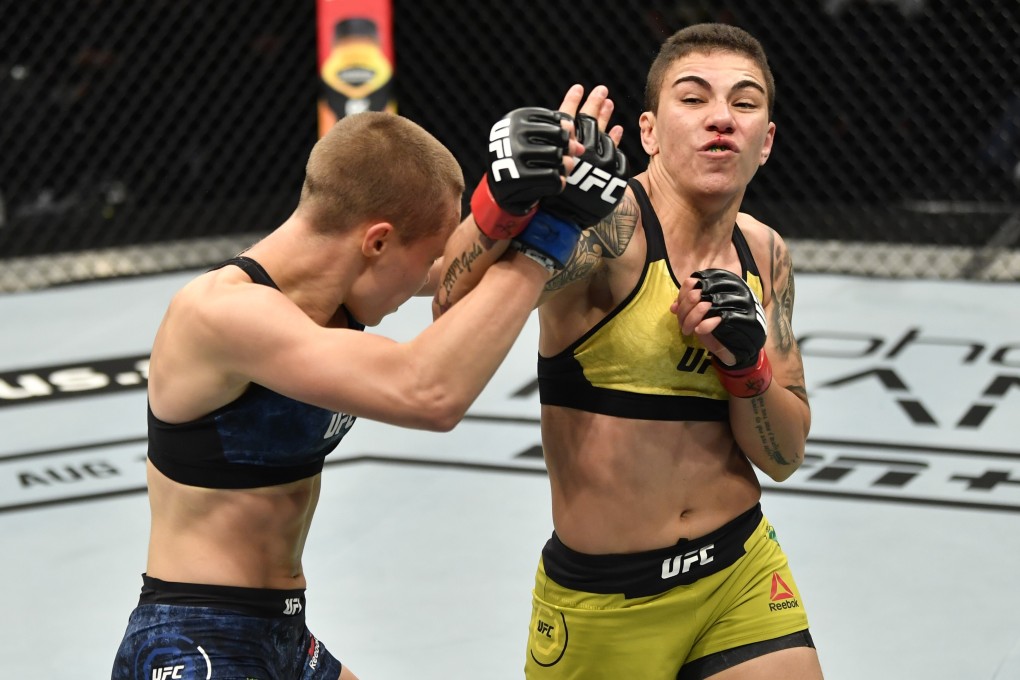 Jessica Andrade punches Rose Namajunas in their strawweight rematch at UFC 251. Photo: USA Today