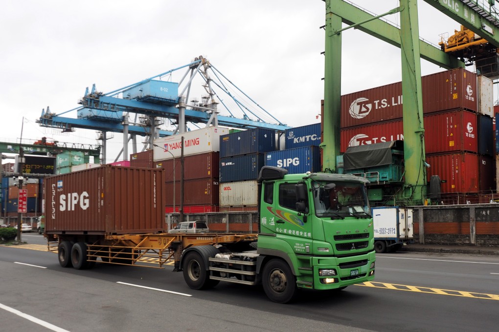 A truck drives through the Keekung Harbor in Keelung City, Taiwan. Photo: EPA-EFE