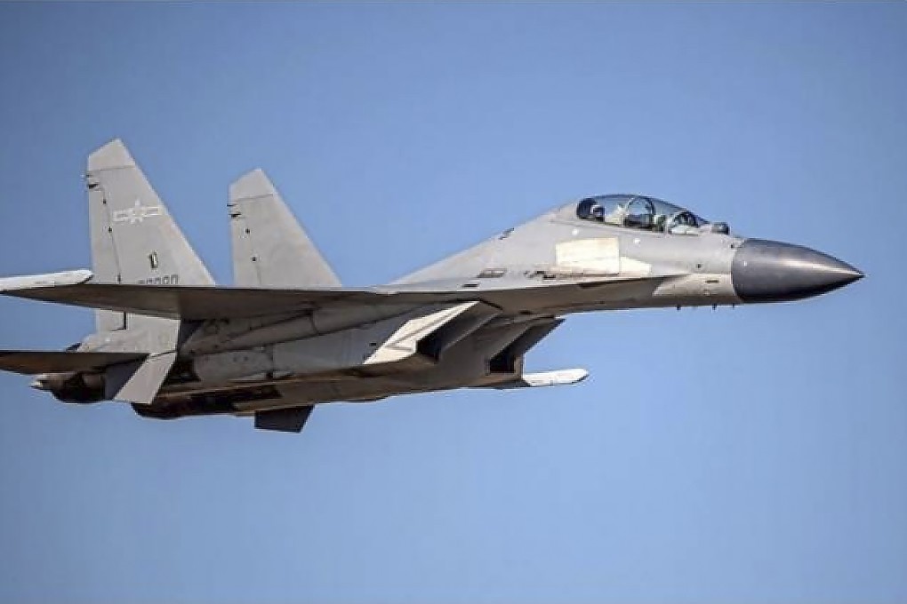 In this undated file photo released by the Taiwan defence ministry, a Chinese PLA J-16 fighter jet flies in an undisclosed location. Photo: Taiwan defence ministry via AP