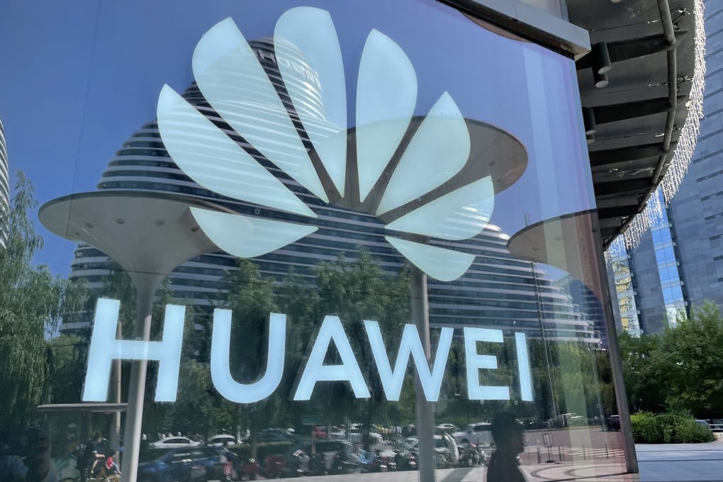 A Huawei logo is pictured on the glass wall of a shopping mall in Beijing, China. Photo: Simon Song
