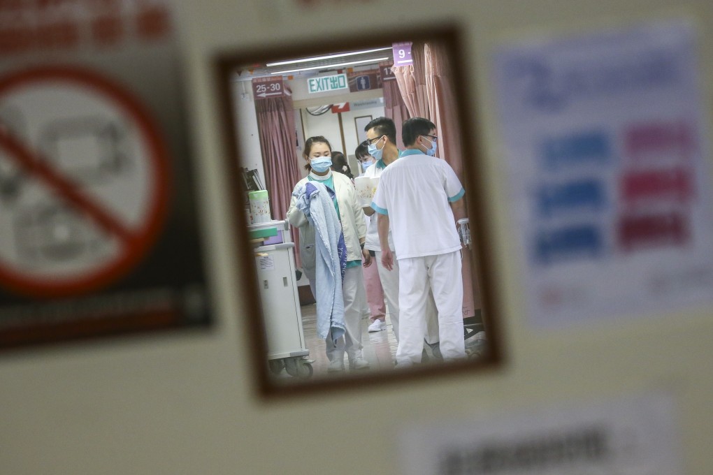 Medical staffs are seen working in a ward at Queen Elizabeth Hospital in Yau Ma Tei. Photo: Felix Wong