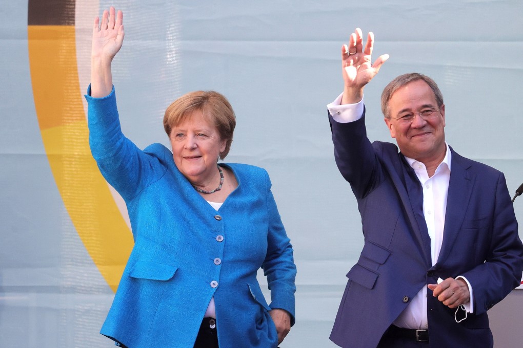 Chancellor Angela Merkel and Armin Laschet (right) at an election campaign in Aachen, Germany, on Saturday. Photo: EPA-EFE