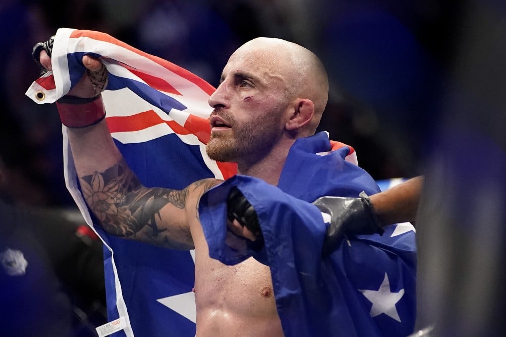 Alexander Volkanovski celebrates after defeating Brian Ortega at UFC 266. Photo: AP