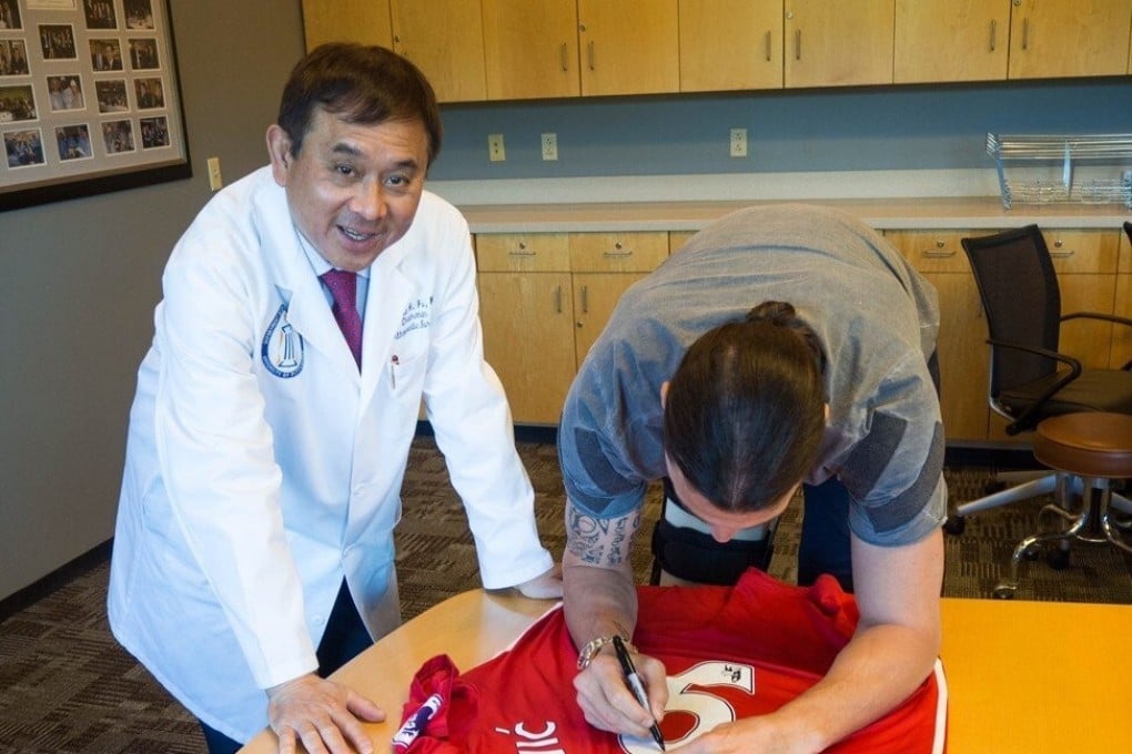 Dr Freddie Fu Ho-keung, who saved the playing career of legendary footballer Zlatan Ibrahimovic, has died at 71. Photos: Freddie Fu