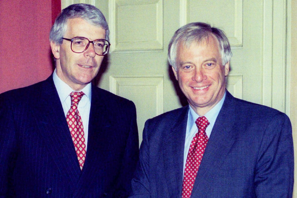 In a 1995 file photo, then Prime Minister John Major, left, greeting the then Governor of Hong Kong Chris Patten at Downing Street, not long after the author began his career at the South China Morning Post. Photo: Reuters