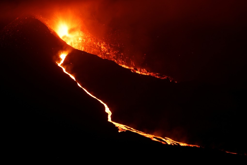 Lava flows from Tijarafe following the new eruption of a volcano on the Canary Island of La Palma, Spain on Saturday. Photo: Reuters