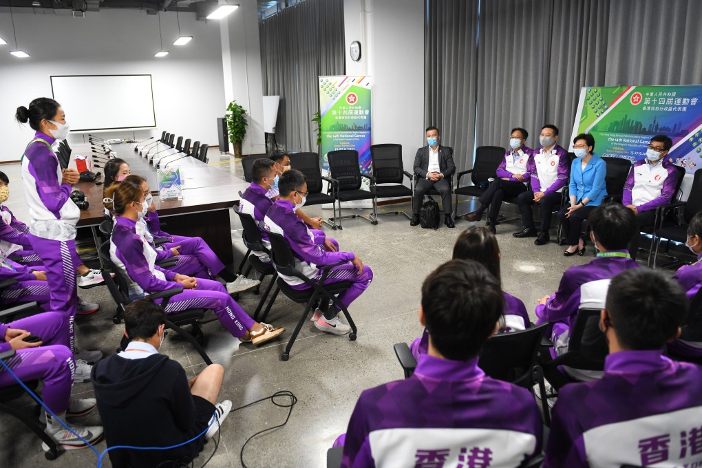 Hong Kong Chief Executive Carrie Lam (upper right, in blue) met the city’s delegation of athletes to the National Games on Sunday. Photo: Handout