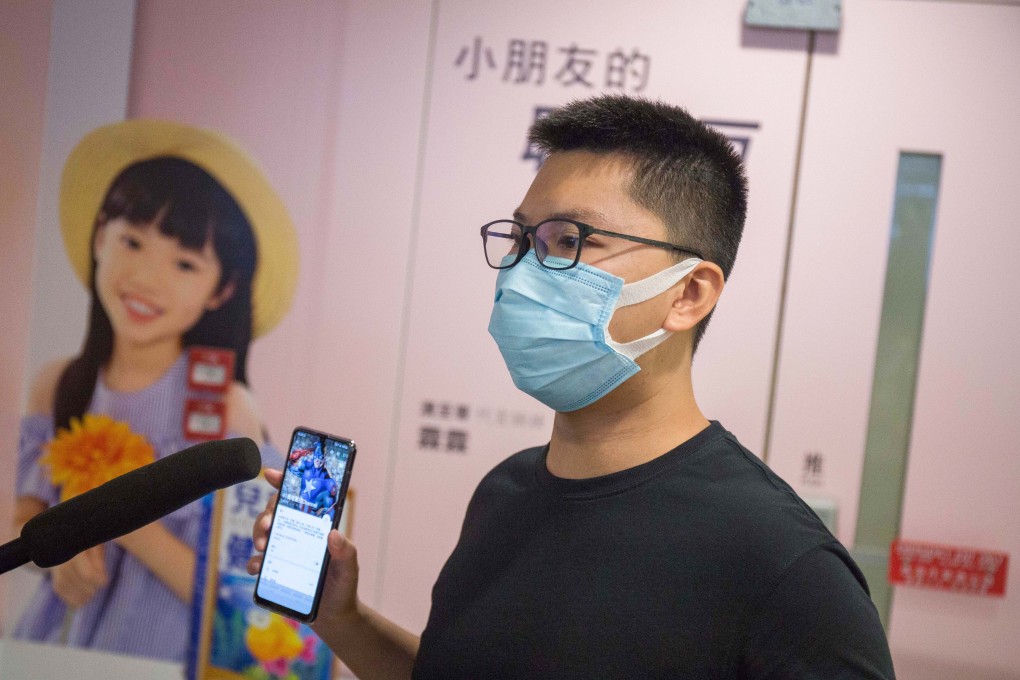 Adam Ma speaks to the press at a Mong Kok shopping centre in October 2020. Photo: Brian Wong