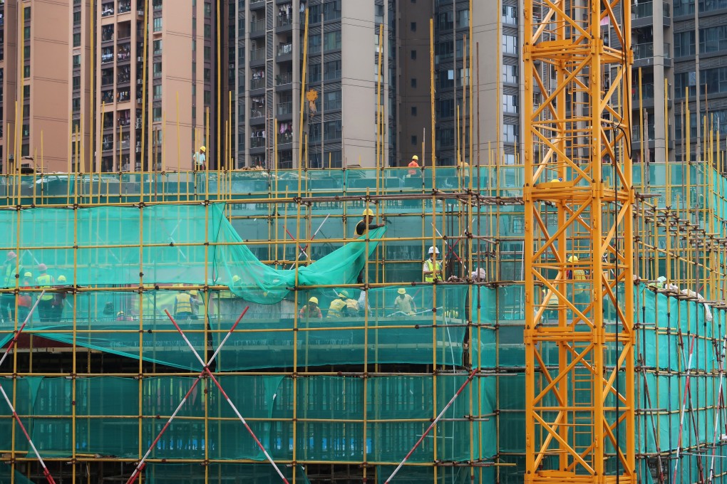 Workers at a construction site in Shenzhen. The city’s government has taken measures to cool down housing prices in the city. Photo: Reuters