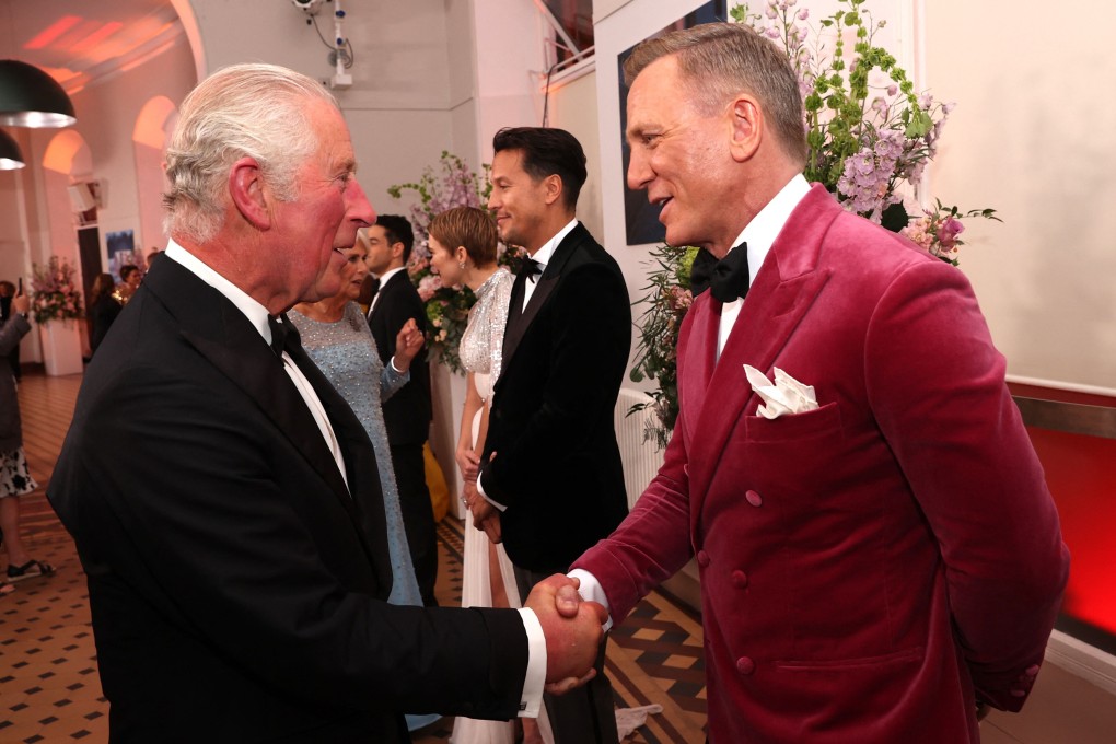 Prince Charles talks to James Bond star Daniel Craig ahead of the world premiere of No Time to Die at the Royal Albert Hall in London on Tuesday. Photo: AFP