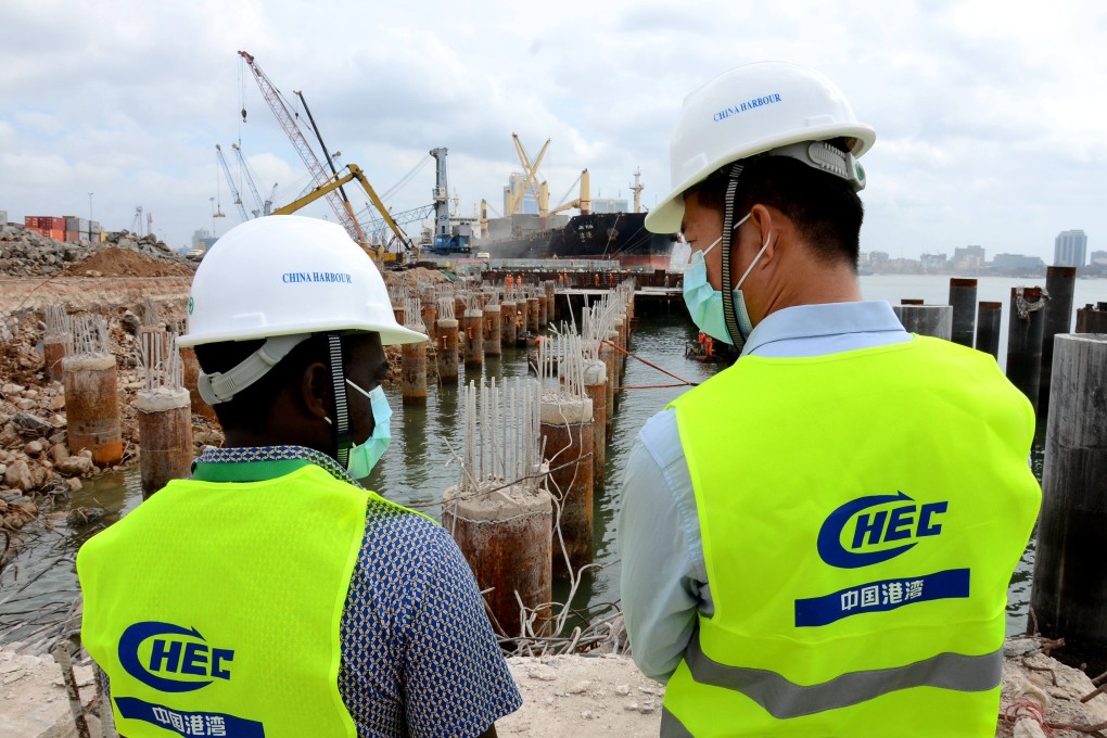 Engineers from China and Tanzania are pictured at the construction site of the Dar es Salaam Port upgrade in Tanzania. A report by AidData says China spent an average US$85.4 billion a year in the five years after the Belt and Road Initiative was launched in 2013. Photo: Xinhua