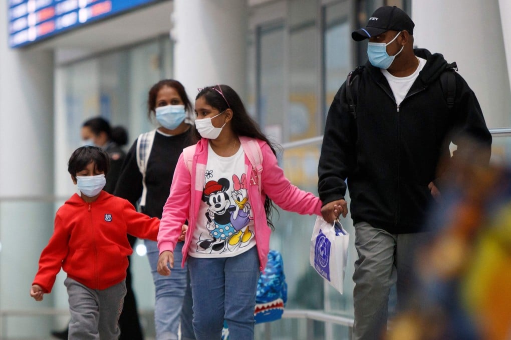 Supun Thilina Kellapatha and his family arrive in Toronto, Canada, as refugees on September 28, 2021. Photo: AFP