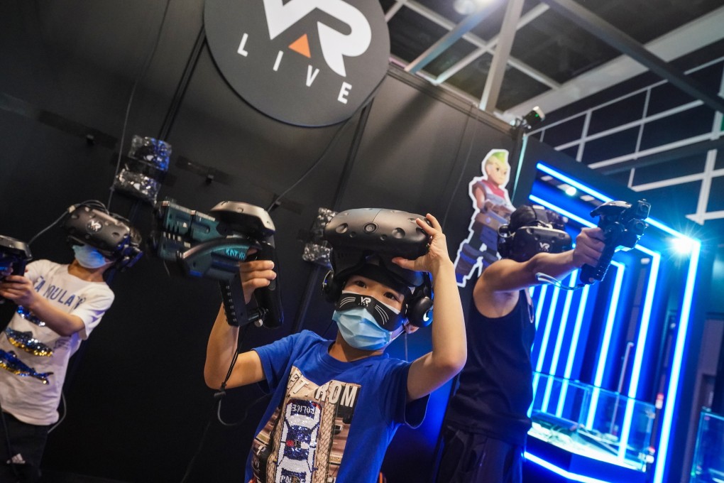 Children play with virtual reality headsets at the Hong Kong Animation-Comics & Games Expo on July 23, 2021. Photo: Felix Wong