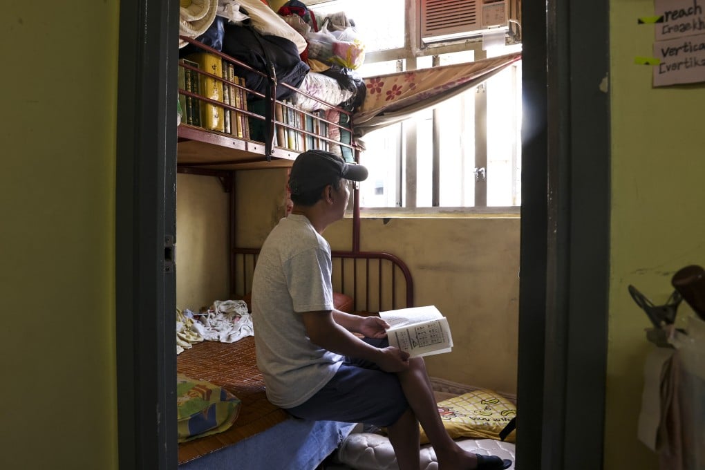 Mainland immigrant Mr Wei sits in his subdivided flat in Hong Kong’s Sham Shui Po neighbourhood. Photo: K. Y. Cheng