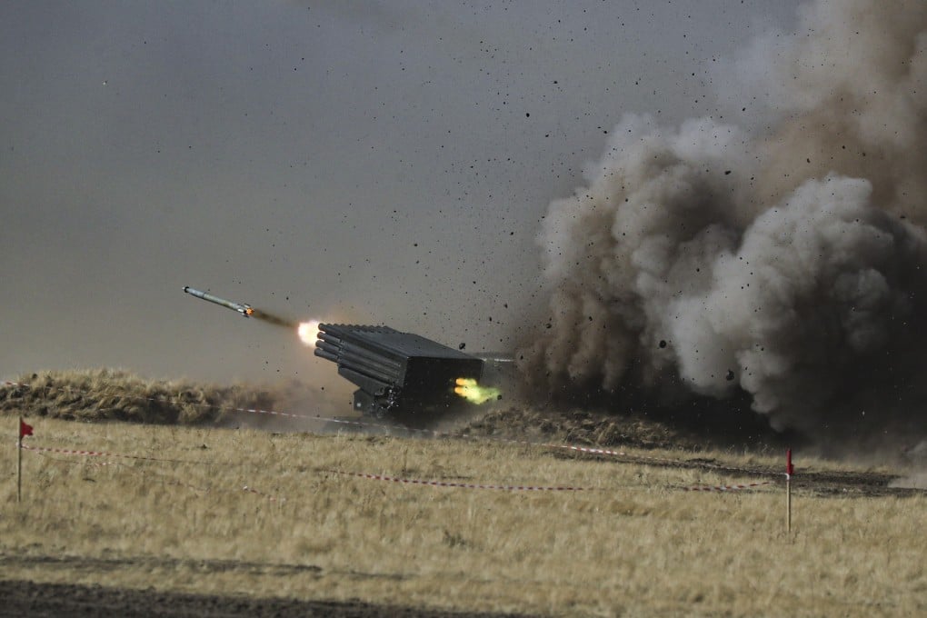 Rocket launchers shoot missiles during the “Peace Mission 2021” joint SCO anti-terrorist military exercise, at the Donguz training ground in Russia’s Orenburg region on September 23. Photo: EPA-EFE