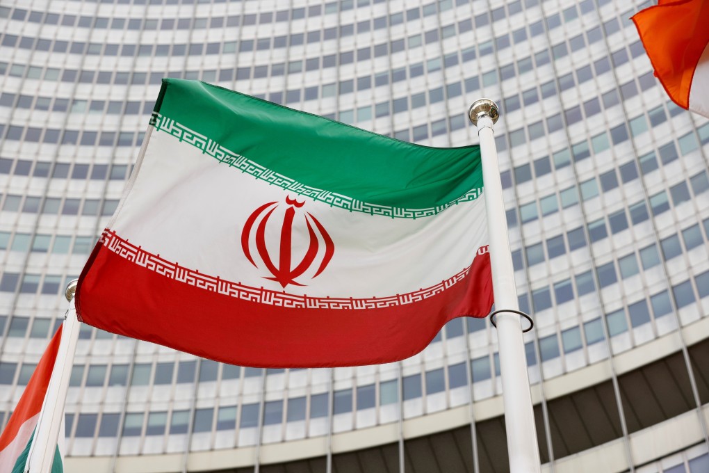 The Iranian flag waves in front of the International Atomic Energy Agency (IAEA) headquarters in Vienna, Austria. Photo: Reuters