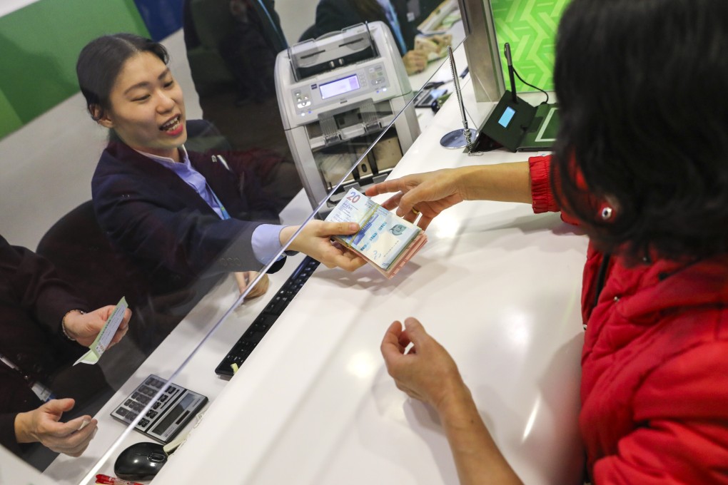 Banks in Hong Kong now offer more than just withdrawal and deposit services. Photo: Winson Wong