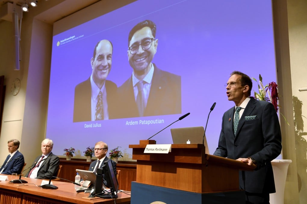 Thomas Perlmann, Secretary of the Nobel Assembly and the Nobel Committee, announces the winners of the 2021 Nobel Prize in Physiology or Medicine at the Karolinska Institute in Stockholm on Monday. Photo: AP