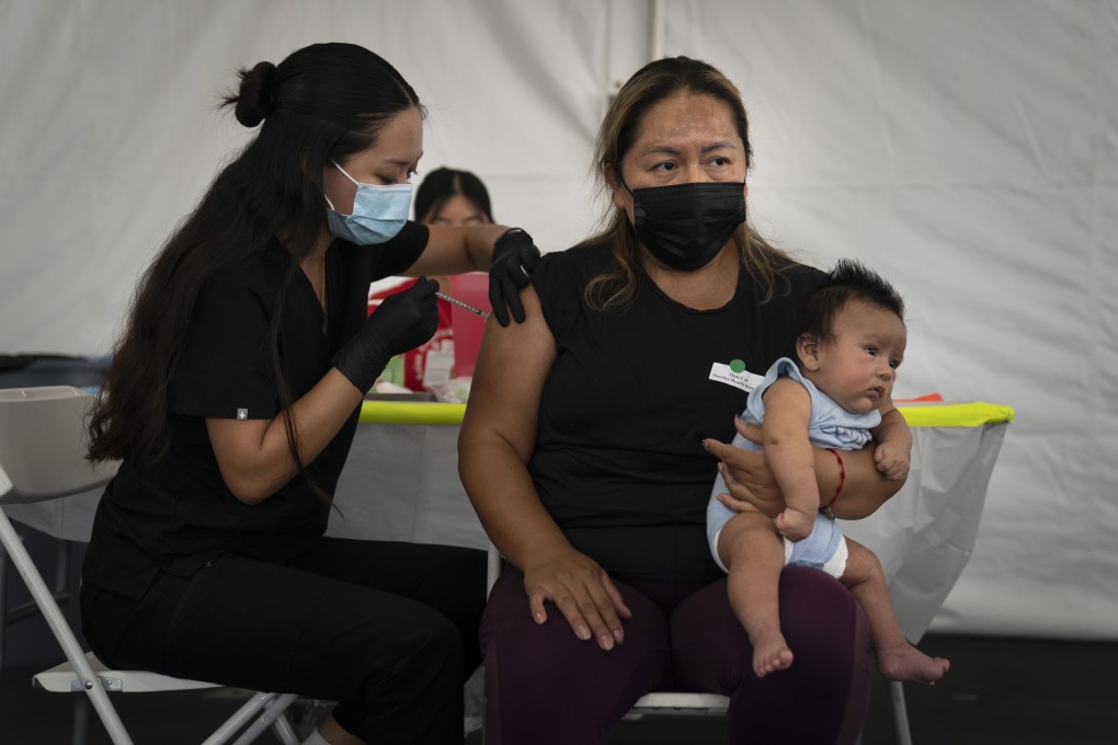 A woman gets vaccinated against Covid-19 in Orange, California. Photo: AP