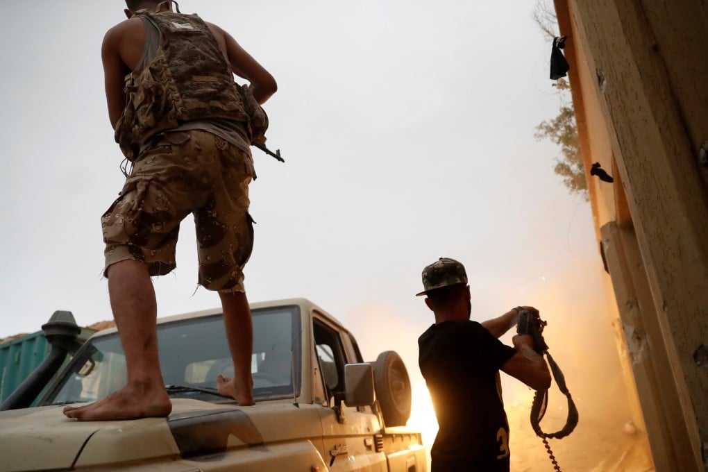 Fighters loyal to Libya's UN-backed government fire guns during clashes on the outskirts of Tripoli. Violence has plagued Libya since the fall of autocrat Muammar Gaddafi in 2011. Photo: Reuters