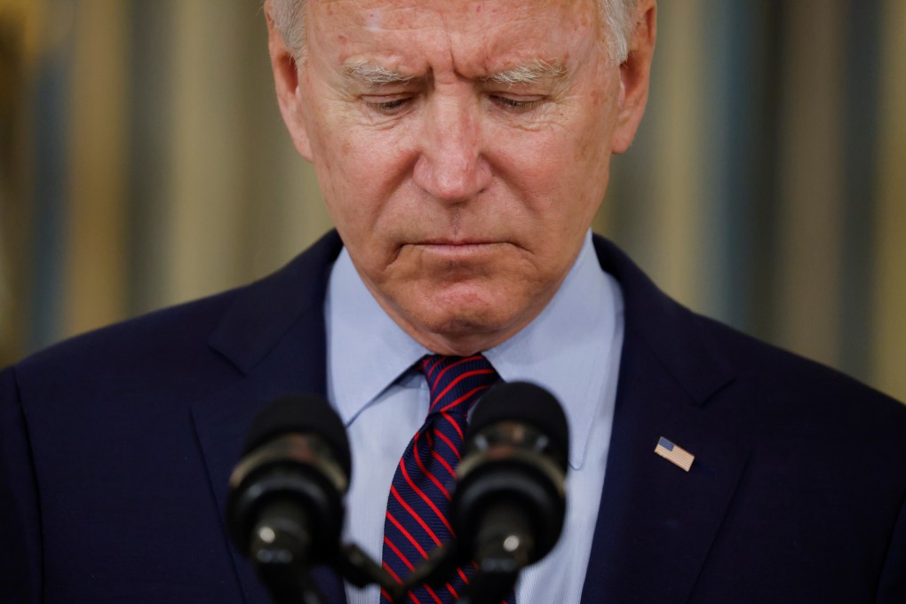 US President Joe Biden looks down as he delivers remarks on the US debt ceiling from the State Dining Room of the White House on Monday. Photo: Reuters