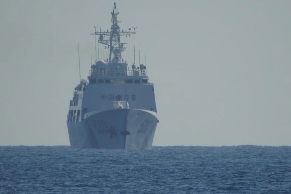 A Chinese coastguard ship sails along Whitsun Reef in the Spratly Islands in April. Malaysian officials have also complained about Chinese coastguard vessels loitering around the South Luconia Shoals off Sarawak. Photo: Philippine Coast Guard via EPA-EFE