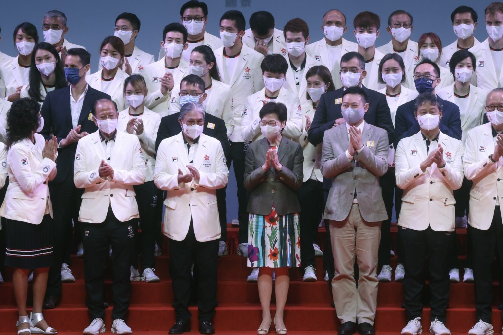 Hong Kong chief executive Carrie Lam Cheng Yuet-ngor (centre) at the welcome home ceremony for the Hong Kong delegation for the Tokyo 2020 Olympic Games. Photo: SCMP/ K.Y. Cheng