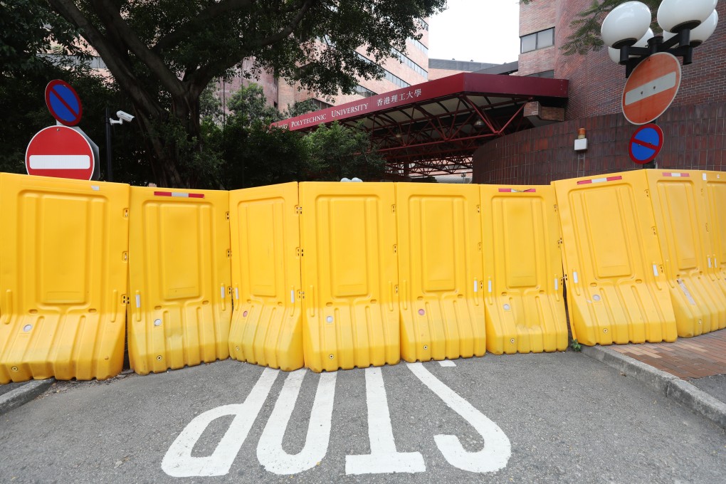 Barriers at the entrance to Hong Kong Polytechnic University after a 13-day lockdown at the school in November 2019. Photo: Xiaomei Chen