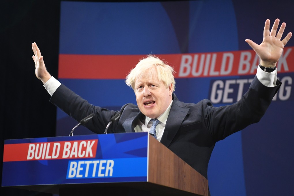 British Prime Minister Boris Johnson delivers a speech at the Conservative Party conference in Manchester on Wednesday. Photo: EPA-EFE