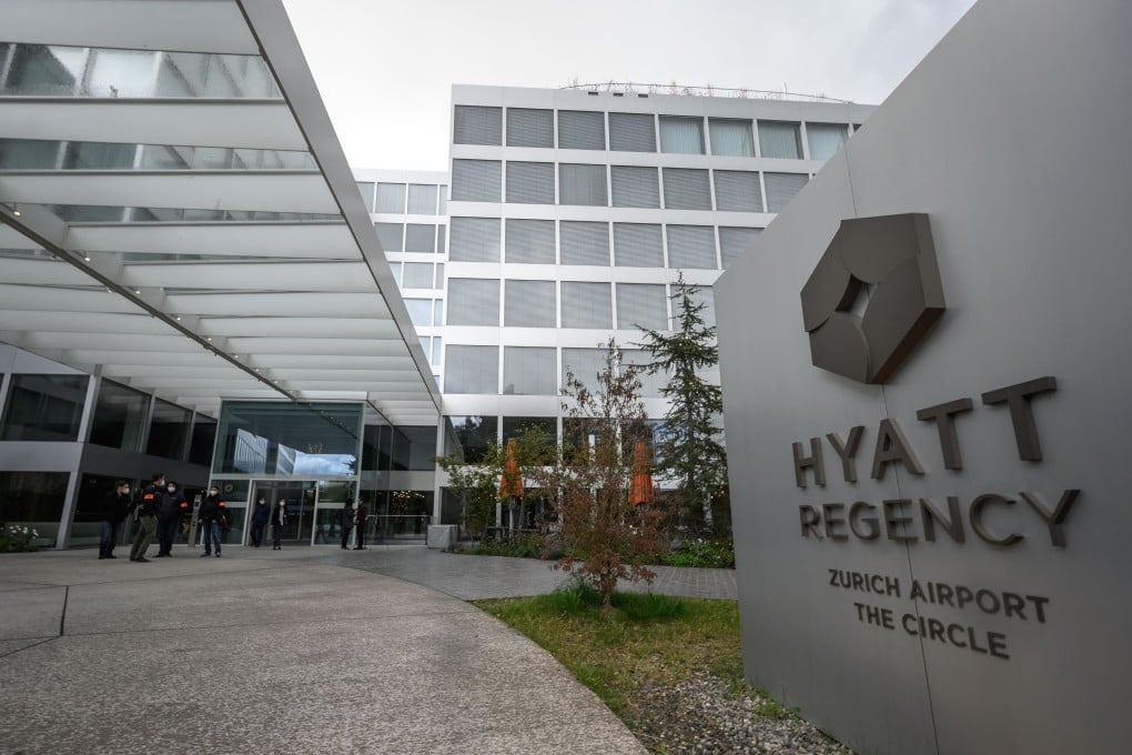 Swiss police stand outside the Hyatt hotel at Zurich Airport where US and Chinese top officials are holding talks on Wednesday. Photo: AFP