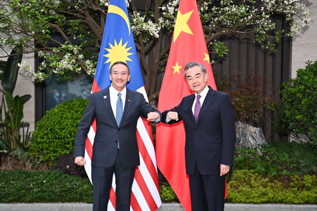 Former Malaysian foreign minister Hishammuddin Hussein with his Chinese counterpart Wang Yi in Nanping City, China’s Fujian province. File photo: Xinhua