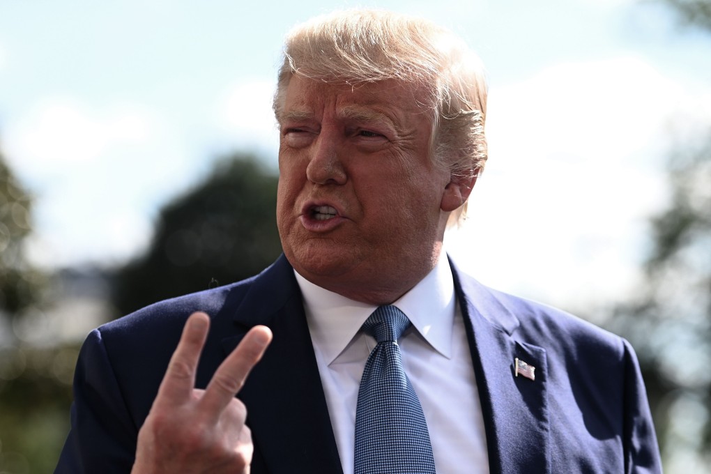 Donald Trump, pictured weeks before his November 2019 trip, talks to journalists on the South Lawn of the White House before travelling to Walter Reed National Military Medical Centre to visit injured military service members. File photo: AFP