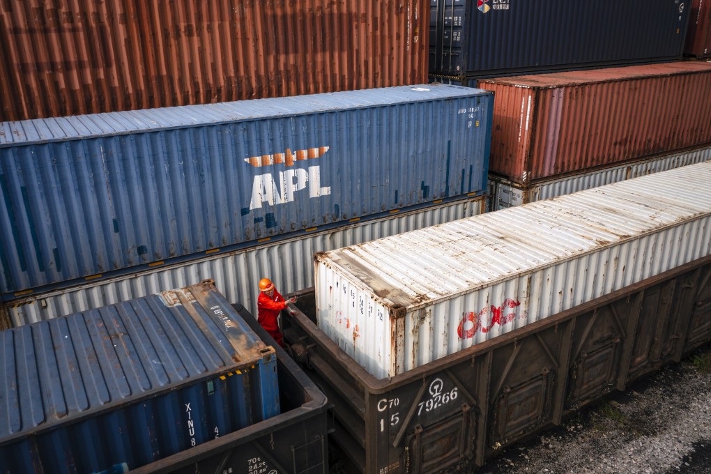 Containers being loaded to the train to Kazakhstan in the China-Kazakhstan logistics base during an organised media tour in Lianyungang, Jiangsu province, China on September 17. The base is recognised as a sample of collaboration between the Belt And Road countries. Photo: EPA-EFE