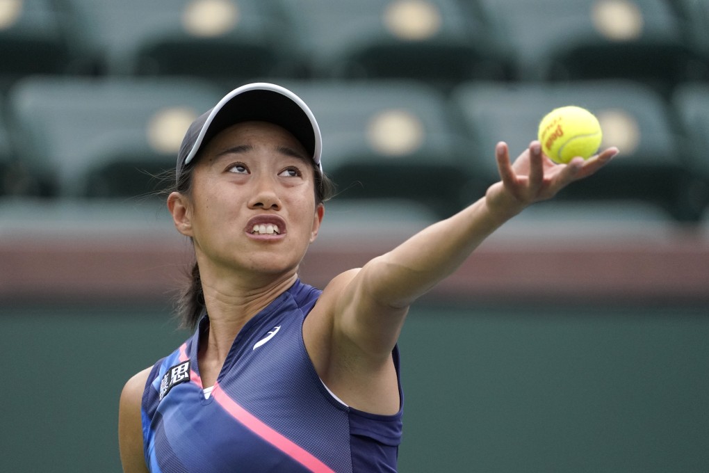 Zhang Shuai of China serves to Marta Kostyuk of Ukraine at the 2021 BNP Paribas Open Indian Wells tennis tournament. Photo: AP