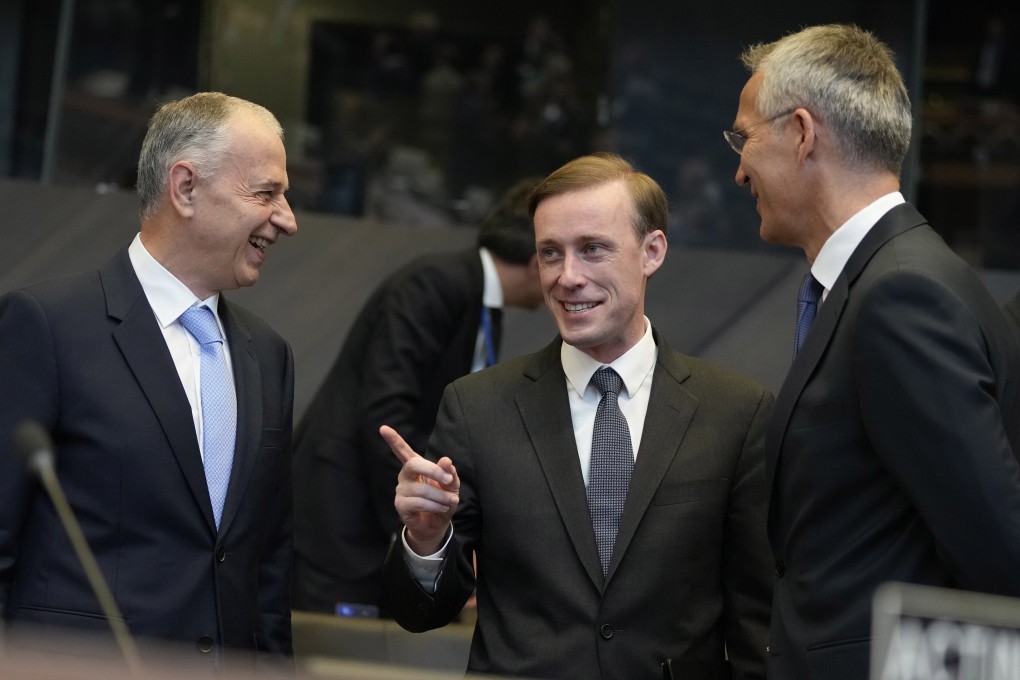 US national security adviser Jake Sullivan, centre, speaks with Nato secretary general Jens Stoltenberg, right, and Nato deputy secretary general Mircea Geoana, left, in Brussels on October 7. Photo: EPA-EFE