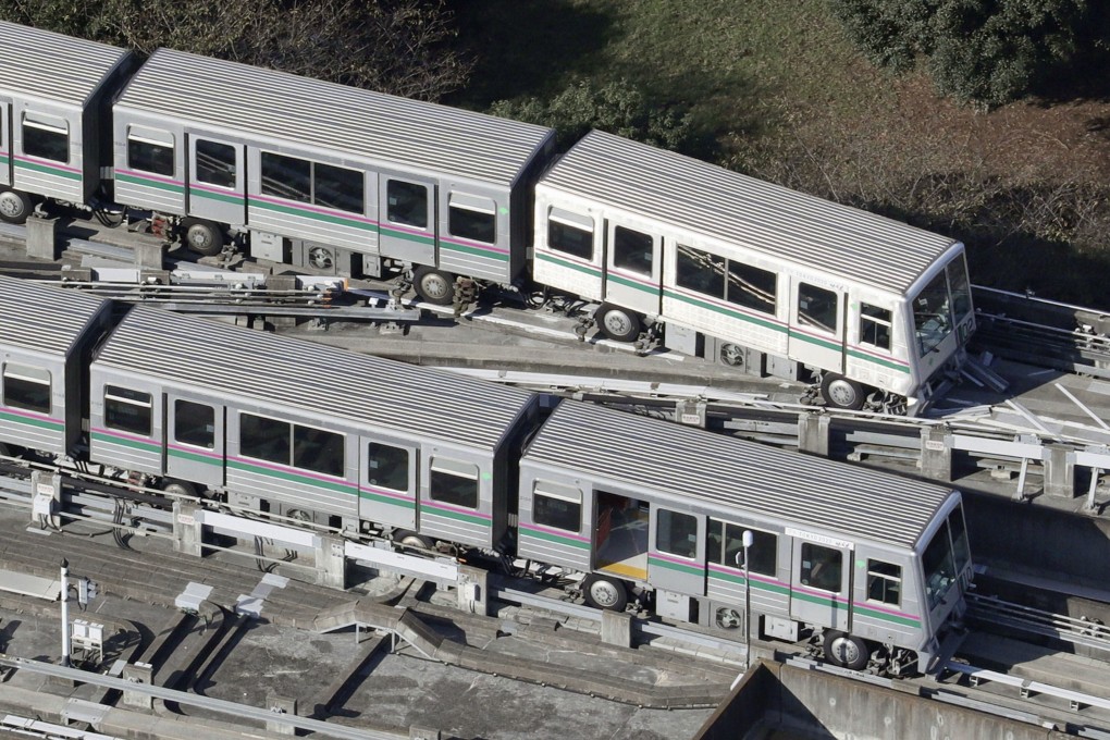 A Nippori-Toneri Liner train that derailed slightly in Tokyo's Adachi Ward after a magnitude-5.9 earthquake jolted the Tokyo region on Thursday night. Photo: Kyodo