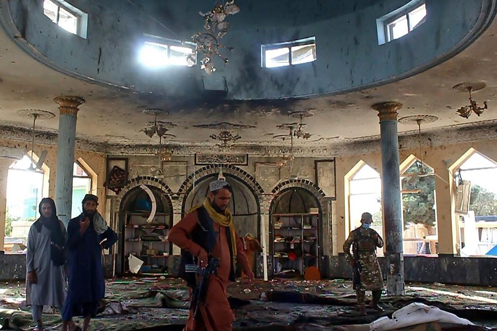 The aftermath of Friday’s suicide bombing at a mosque in Kunduz, Afghanistan. Photo: TNS