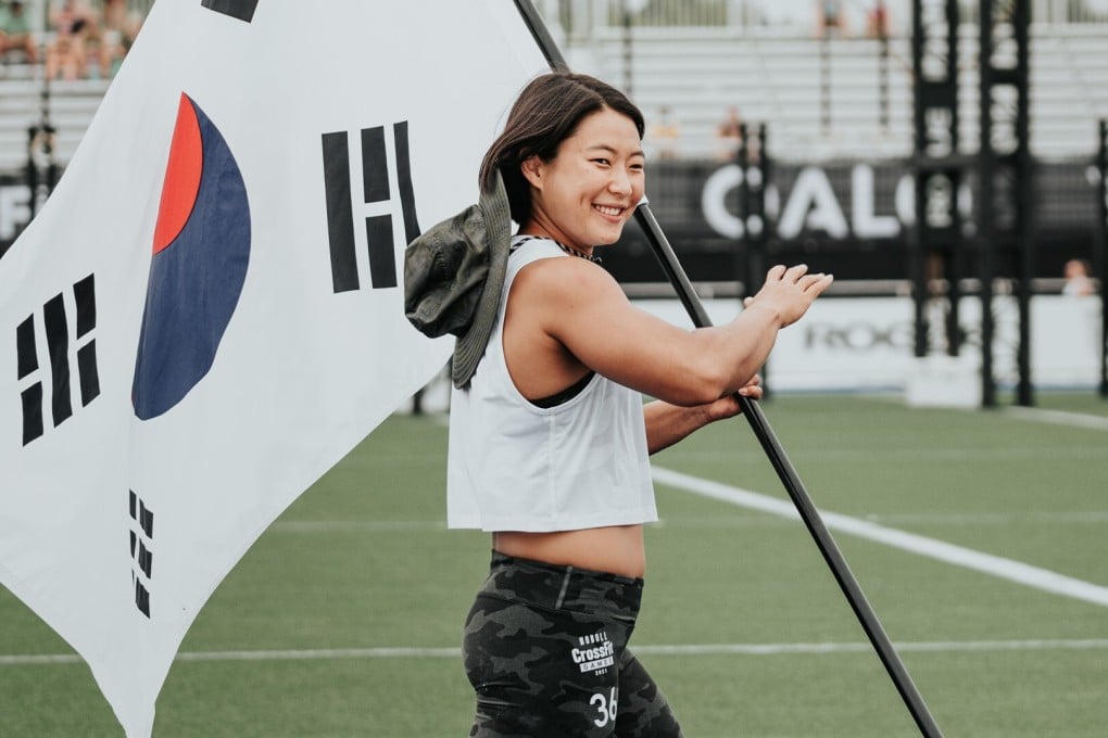 Choi Seung-yeon parades the South Korean flag at the 2021 NOBULL CrossFit Games. Photos: Handout