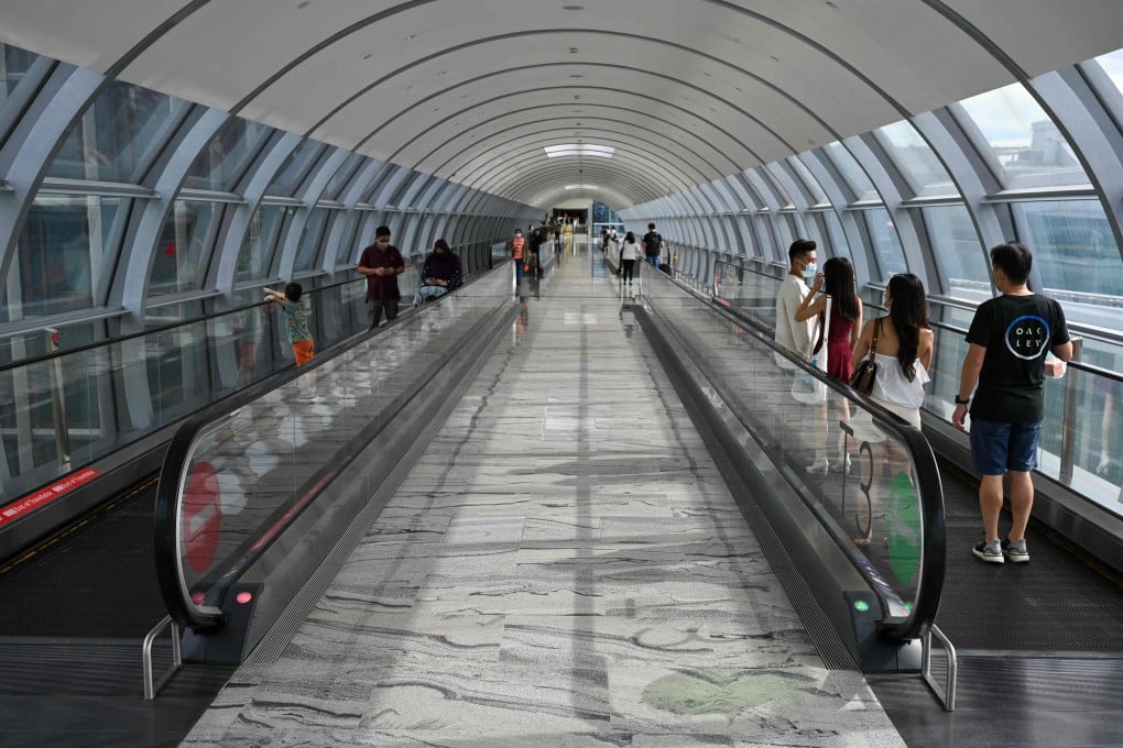 Travellers at Changi Airport in Singapore. Photo: AFP