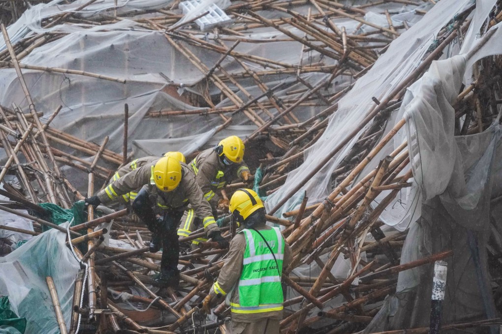 Firefighters search for people after scaffolding collapsed on Broadwood Road in Happy Valley. Photo: Felix Wong