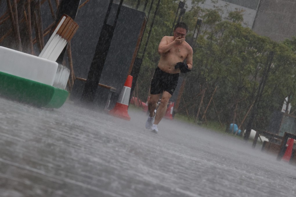 Heavy rain and strong winds in Wan Chai under typhoon signal No 8 as Tropical Storm Lionrock approached the territory. Photo: SCMP / Nora Tam