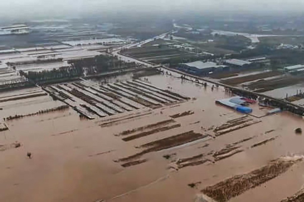 Days of heavy rains in north China’s Shanxi province have forced 120,000 people to relocate and caused floods and landslides that resulted in at least five deaths. Photo: People’s Daily